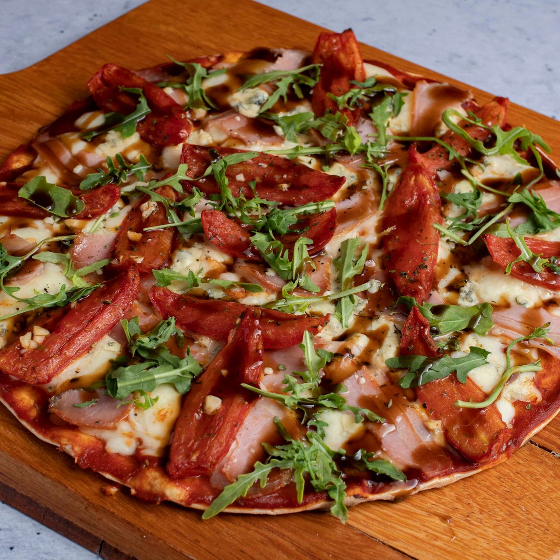 Pizza Prosciutto y Arúgula Familiar