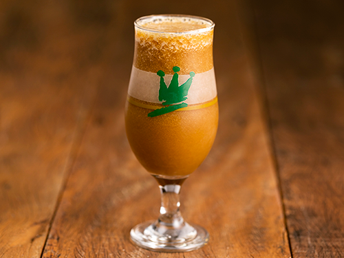 Mate batido com xarope de Guaraná e polpa de fruta.