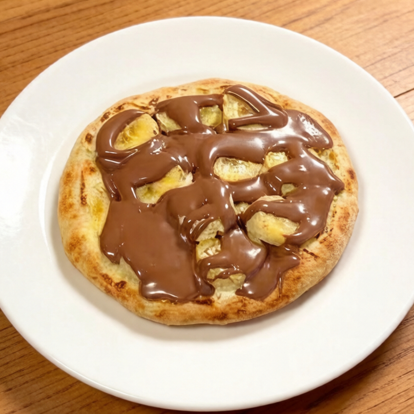 Banana coberta com chocolate