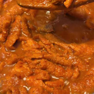 Taco de Chicharrón en Salsa Roja