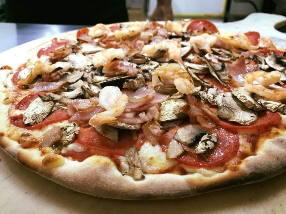 1 PIZZA LA CREACION + 1 NARANJADA