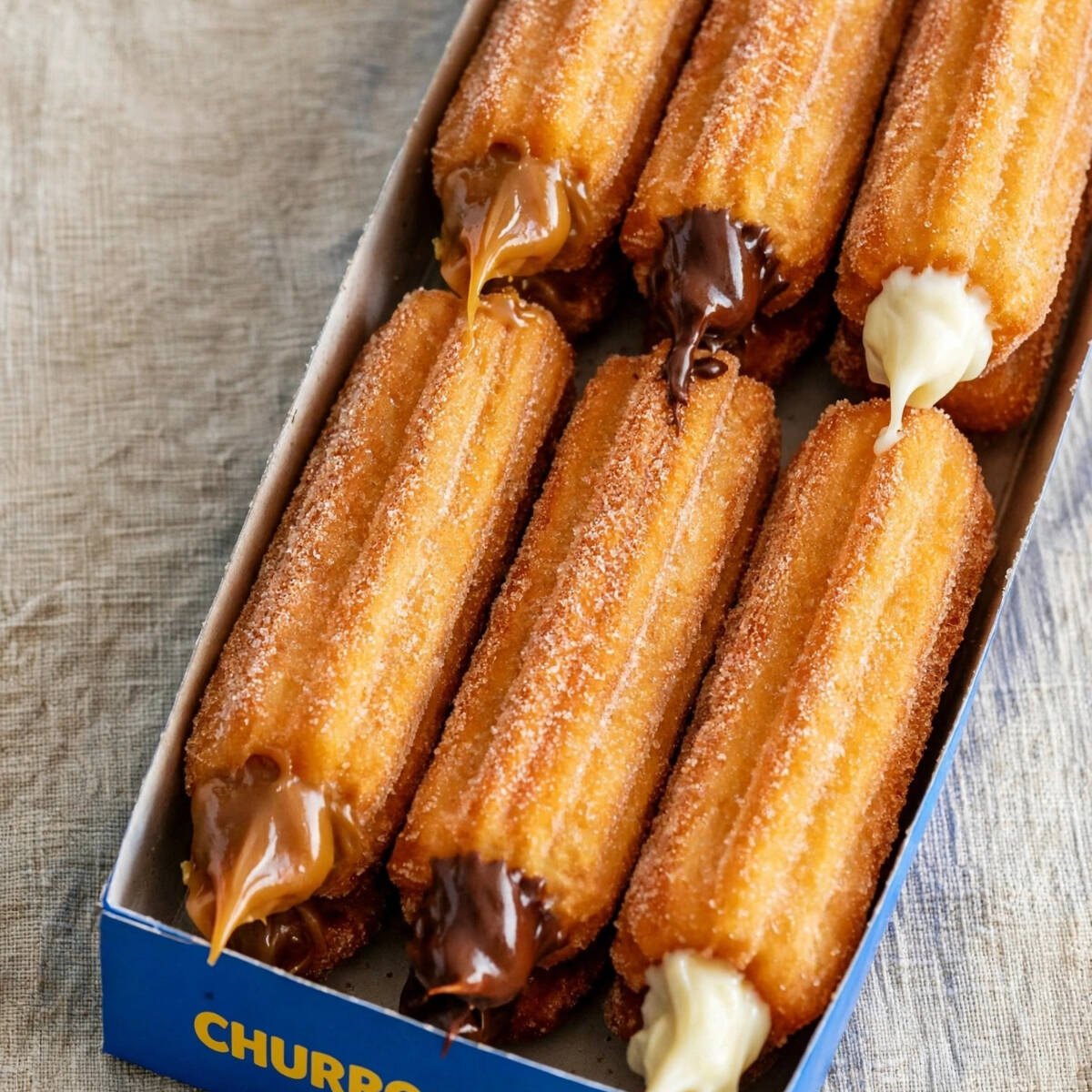 PAGA 3 Y RECIBE 6 CHURROS RELLENOS