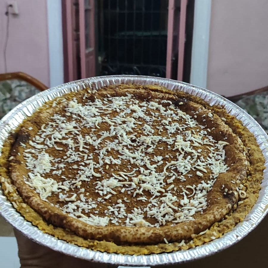 Pay De Queso Con Cubierta De Cocoa y Coco