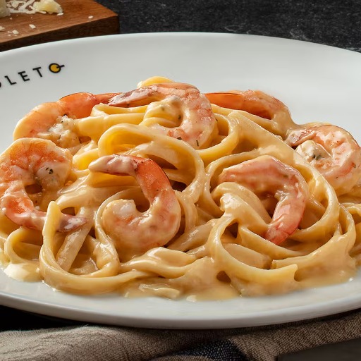 200g massa italiana importada ao molho al mare, feito à base de caldo de frutos do mar com toque de vinho branco, servida com 60g de camarões speciali.