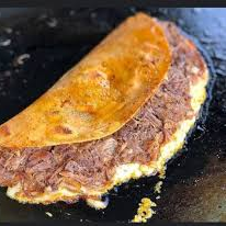Taco de birria con queso