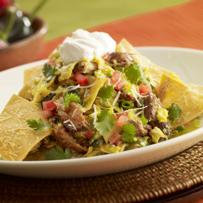 Green Chilaquiles with Carnitas and Eggs