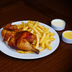 1/2 Pollo con Papas + Ensalada + 2 PEPSI +Tequeños