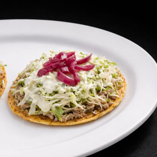 TOSTADA DE DESHEBRADA (1PZ)