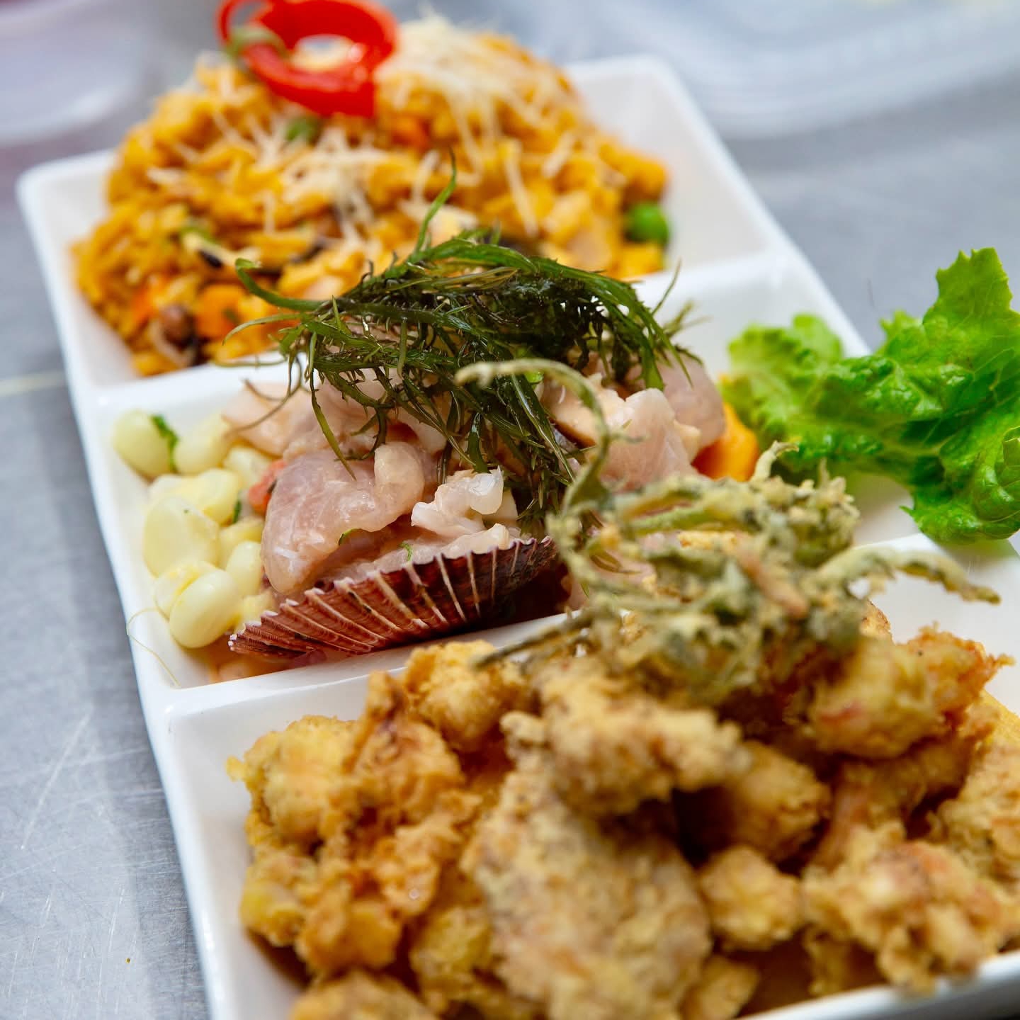 Trío:Ceviche Mixto, Arroz c/ M. y Chicharrón Pesc.