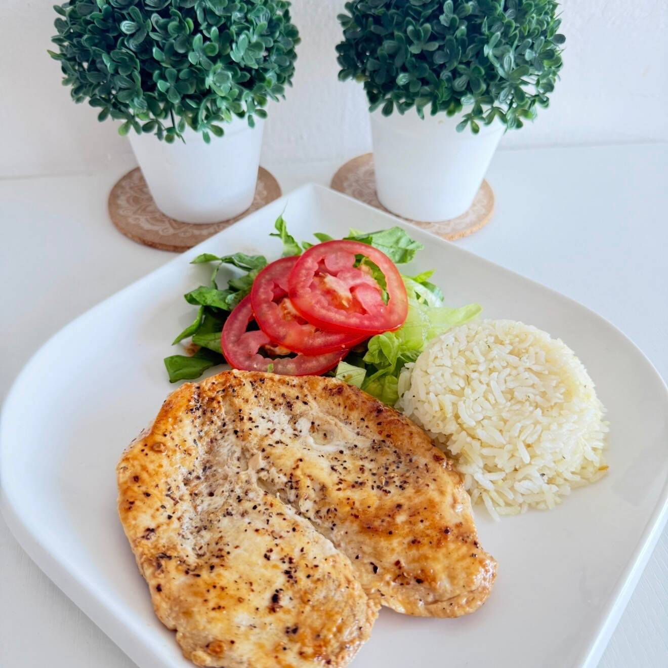 Milanesa de pechuga de pollo a la plancha