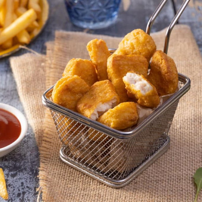 SEIS NUGGETS TEMPURA de Pollo con Papas Fritas