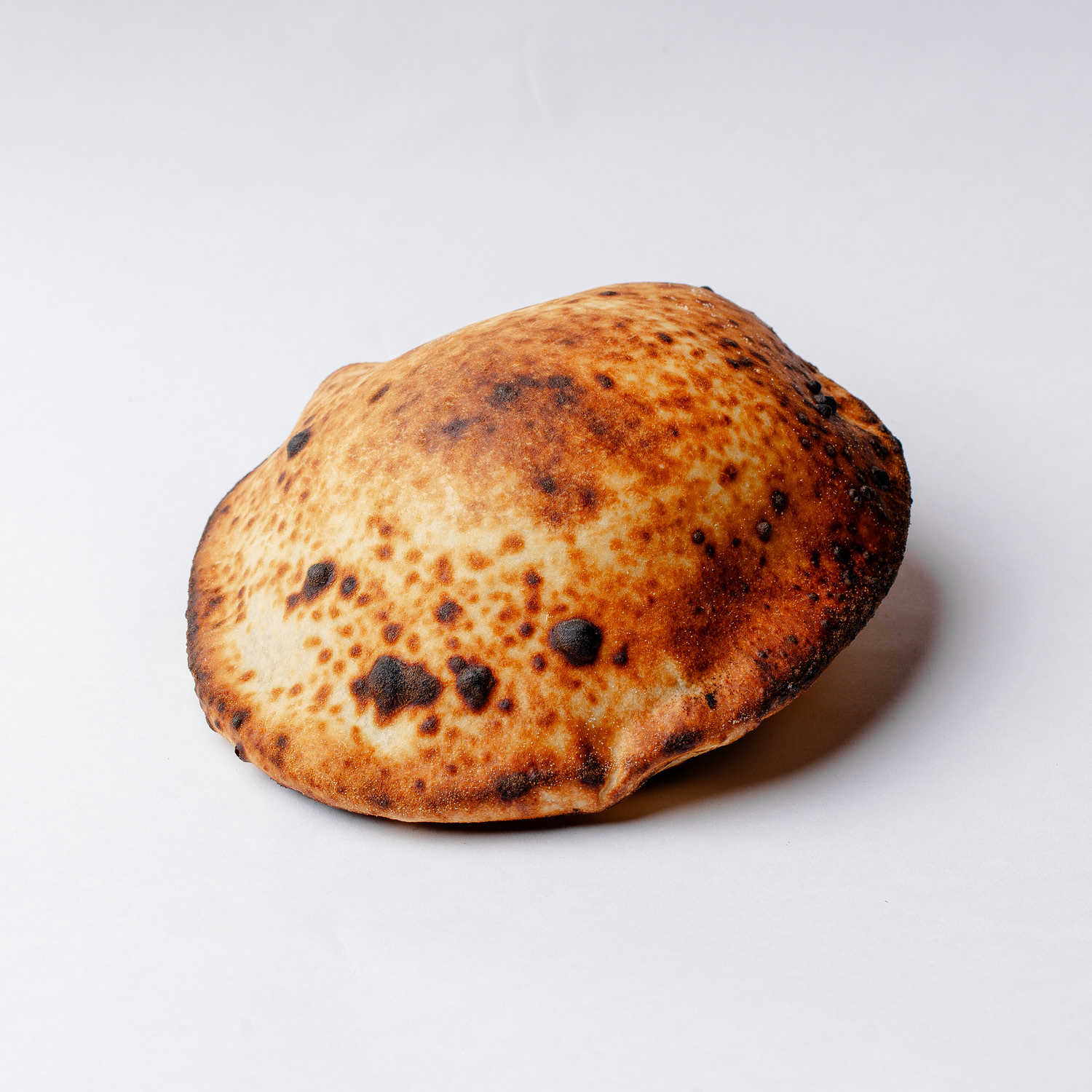 PÃO PITA DA CASA ASSADO NO DIA! VEGANO. CONTÉM GLÚTEN.