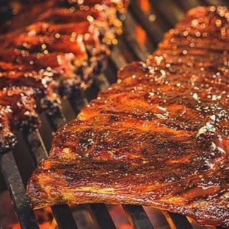 1/2 ORDEN DE COSTILLAS AHUMADAS ARTEZANAL A LA BBQ