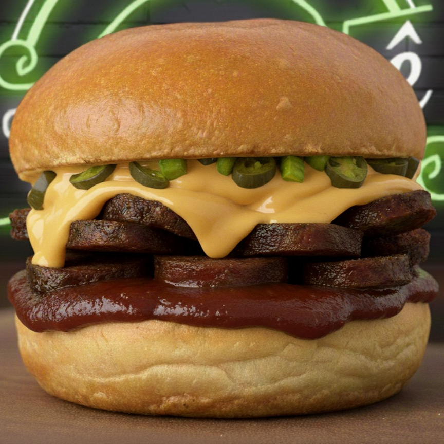 Linguiça calabresa da casa cortada em rodelas, acompanhada de molho barbecue, molho cheddar de castanha de caju, fatias de pimenta jalapeño, no pão brioche. Alergênicos: Contém Aveia, Derivados De Trigo E Soja. Pode conter Castanha De Caju. Contém Glúten.