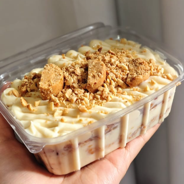 250ml. Pavê cremoso de ninho com amendoim crocante. Camadas de biscoito maisena que combinam com a crocância do amendoim e cremosidade do ninho.