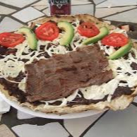 Combo Tlayuda de Tasajo + Agua del dia
