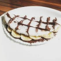 Tapioca Banana Nevada - Mussarela, Banana, Chocolate preto + Chocolate Branco