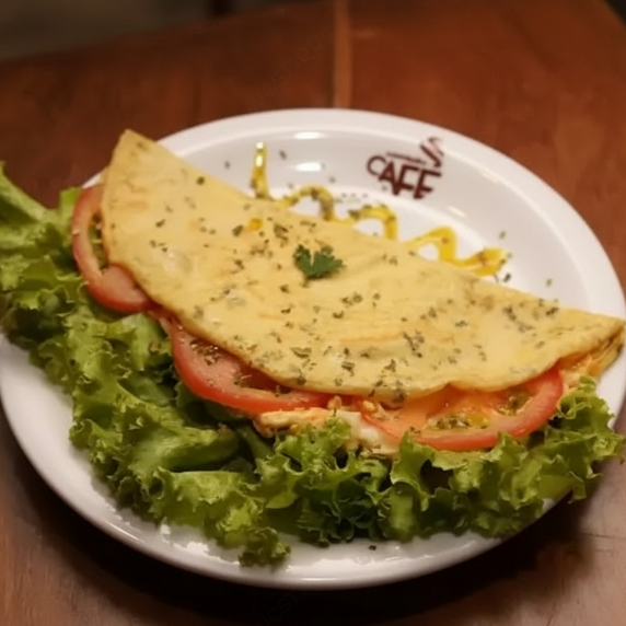 Crepioca recheada com queijo e presunto de peru, salada de alface e tomate.