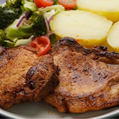 CHULETA DE CERDO FRITA