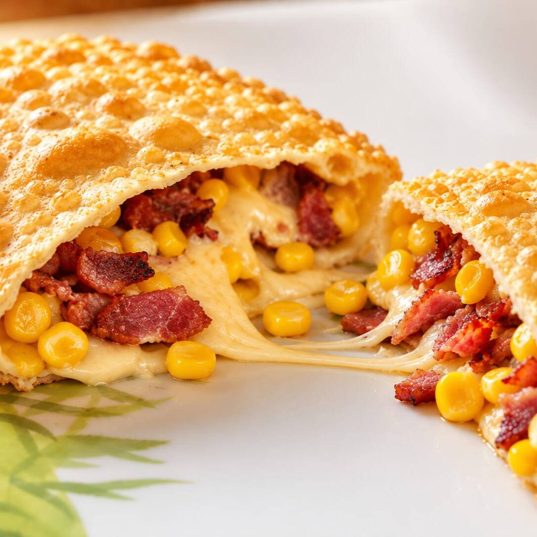 Queijo mussarela, bacon e milho