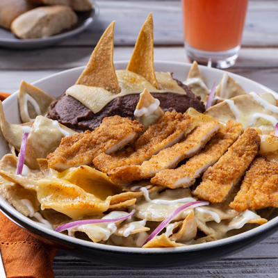 CHILAQUILES CON MILANESA