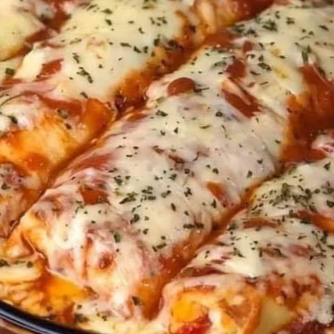 Panqueca Carne Moída, com ingredientes caseiros, cobertura de mussarella. Aprox.500g.