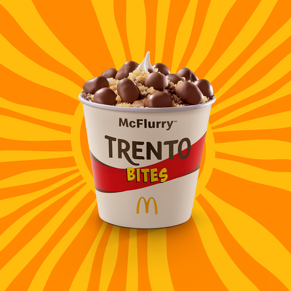 Sobremesa composta por bebida láctea sabor baunilha, cobertura sabor chocolate, morango ou caramelo, Trento Bites e ainda por cima com farofa crocante de amendoim.