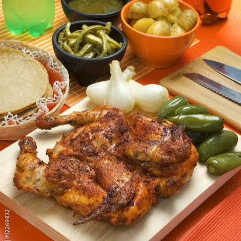 GRATIS MEDIO POLLO EN LA COMPRA DE UN POLLO