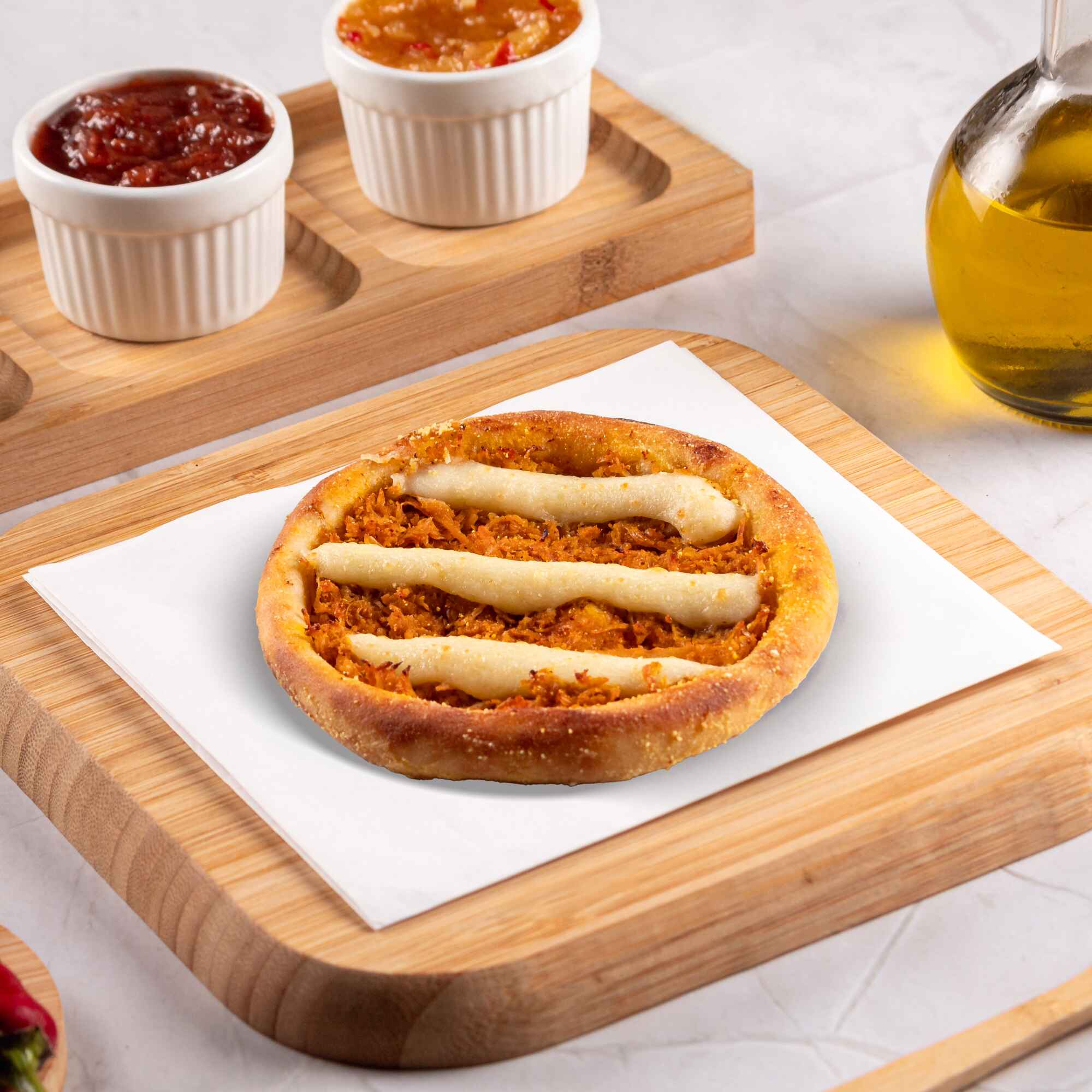 Recheada com frango desfiado e Catupiry Original, macia e cremosa em cada pedaço.