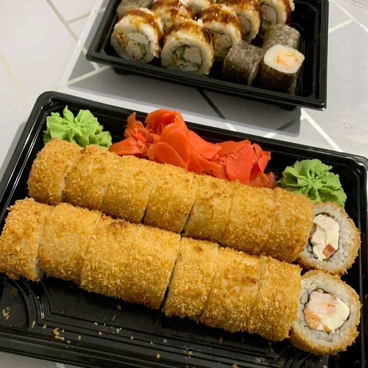20 Piezas Tempuras + 2 Gyozas + 2 Te Fríos