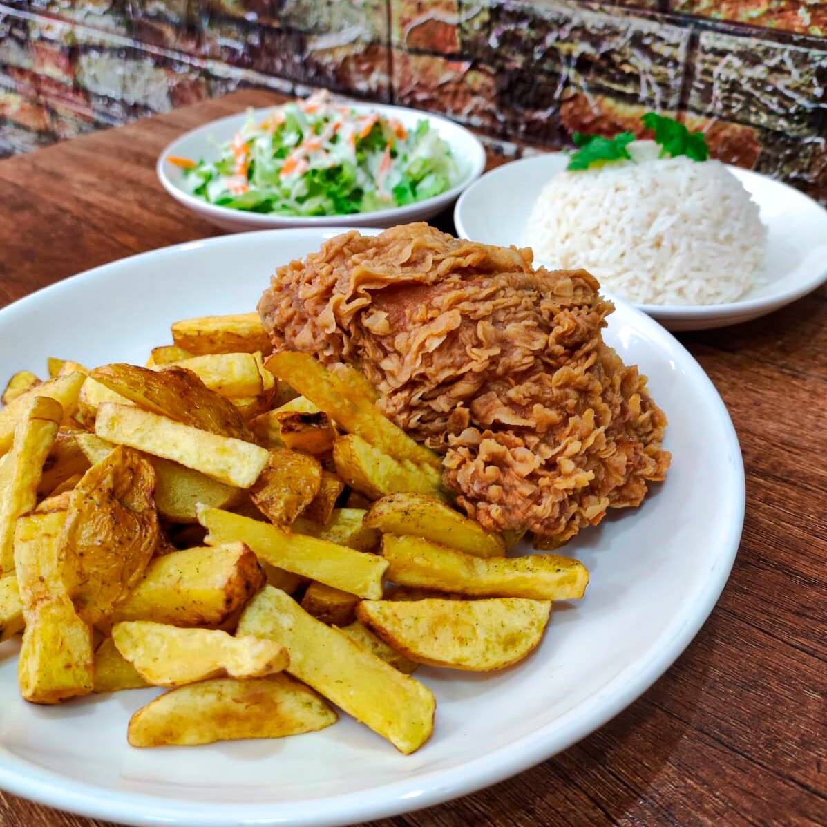 1 Pza Pollo + Papas Aromatizadas