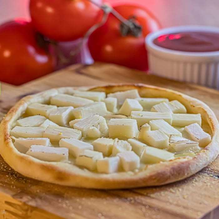 Mussarela coberto por palmito.