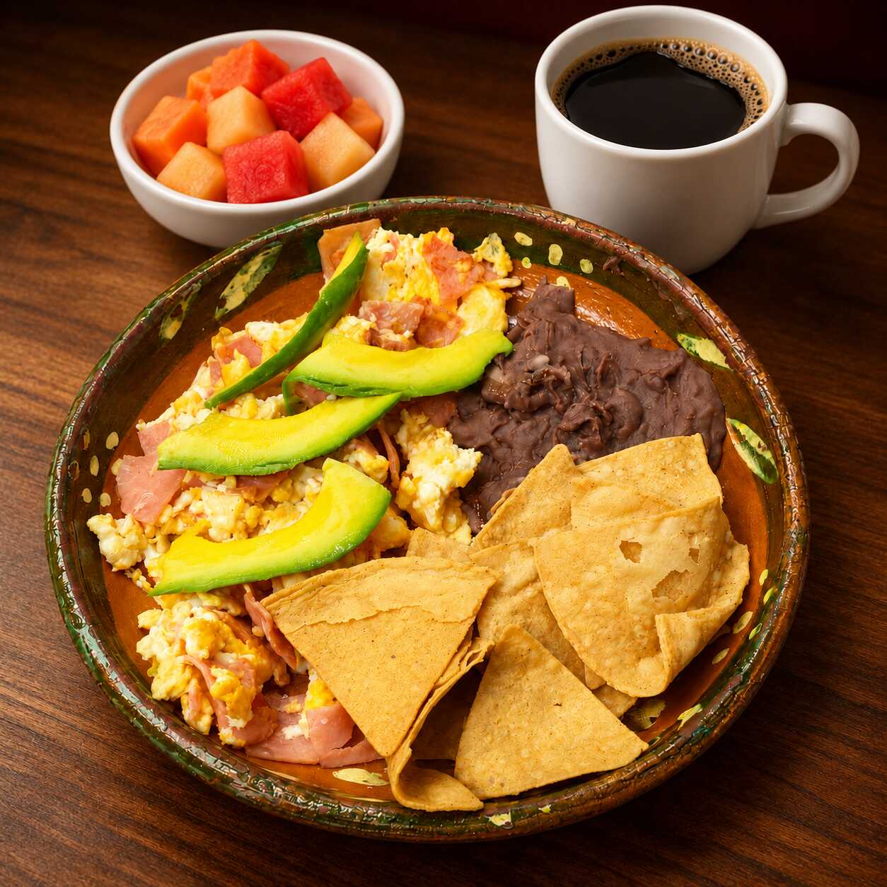 Huevos al Gusto + Café o Té + Fruta.