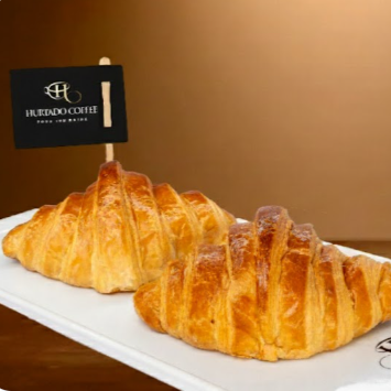 Acompanha manteiga ou Geléia