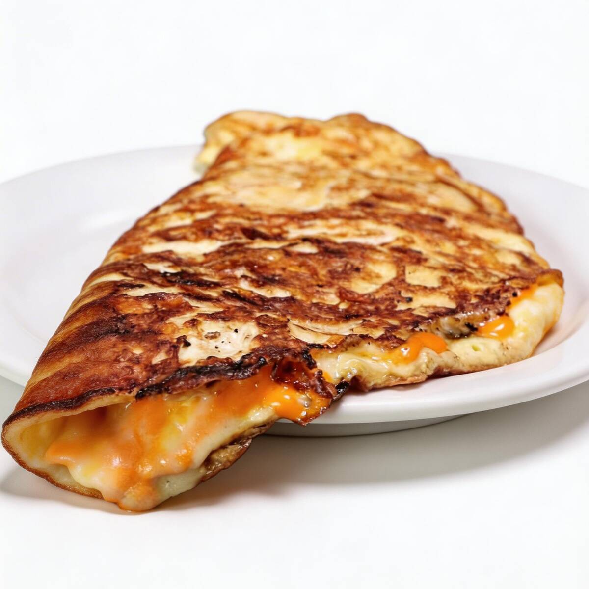 Apresentamos a irresistível Omelete 4 Queijos, uma explosão de sabores que vai conquistar o seu paladar. Preparada com dois ovos frescos e batidos cuidadosamente, essa omelete é recheada com uma combinação divina de queijos que vão te deixar com água na boca.
Imagine-se saboreando cada garfada dessa omelete, onde o queijo prato se derrete suavemente, enchendo a sua boca de cremosidade e sabor. O queijo branco adiciona uma nota refrescante e leve, enquanto o cheddar traz aquele toque defumado e intenso que você adora. E para completar essa festa de sabores, o provolone entra em cena com sua textura macia e seu sabor levemente picante, envolvendo cada pedacinho dos ovos.
A Omelete 4 Queijos é mais do que uma refeição, é uma experiência gastronômica que vai te transportar para um mundo de prazer culinário. Com cada mordida, você sentirá a combinação perfeita desses quatro queijos derretidos, criando uma sinfonia de sabores inesquecível.