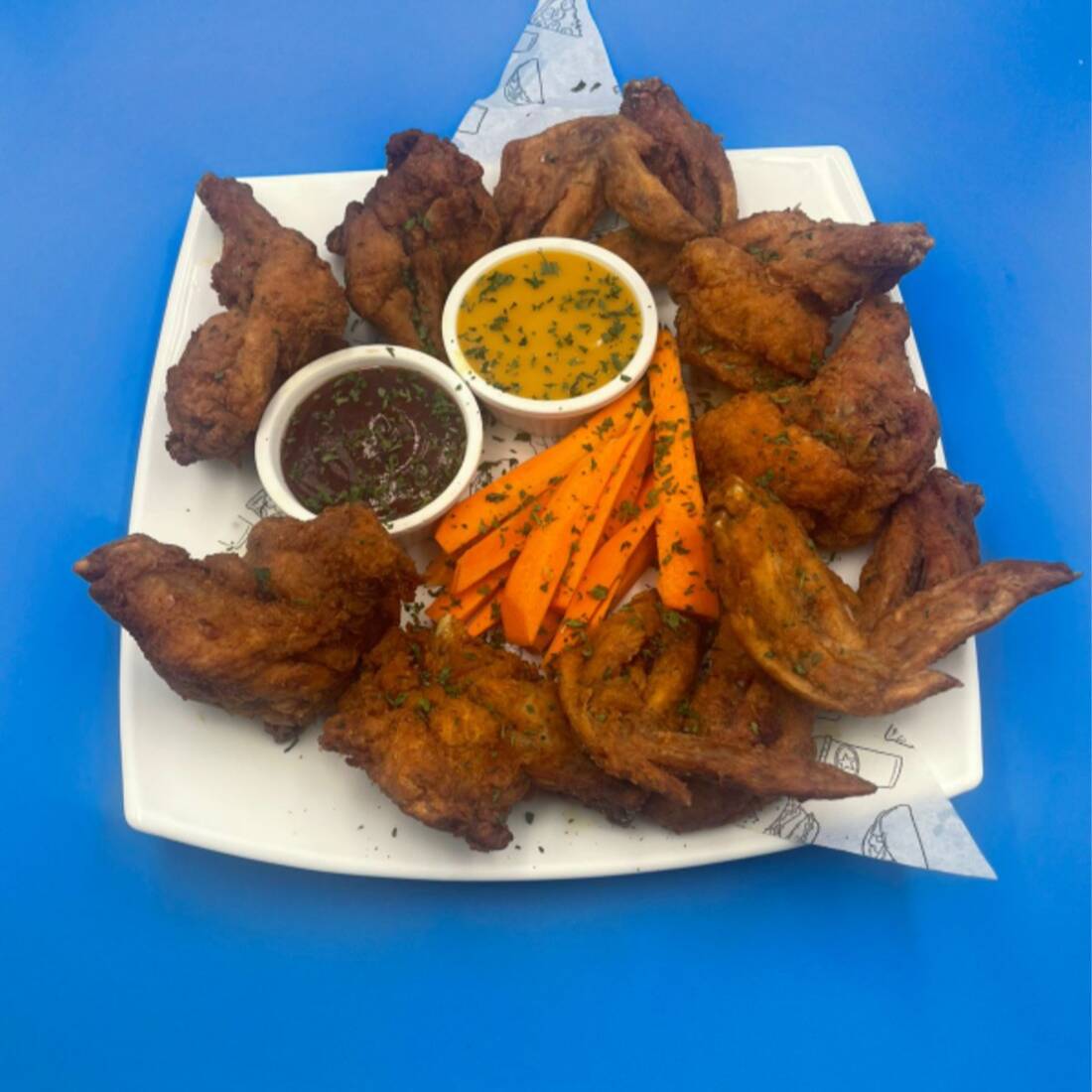 12 Alitas + 2 Salsas