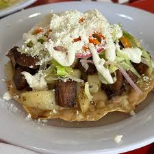 2 Tostadas de Asado y Un Agua del Dia