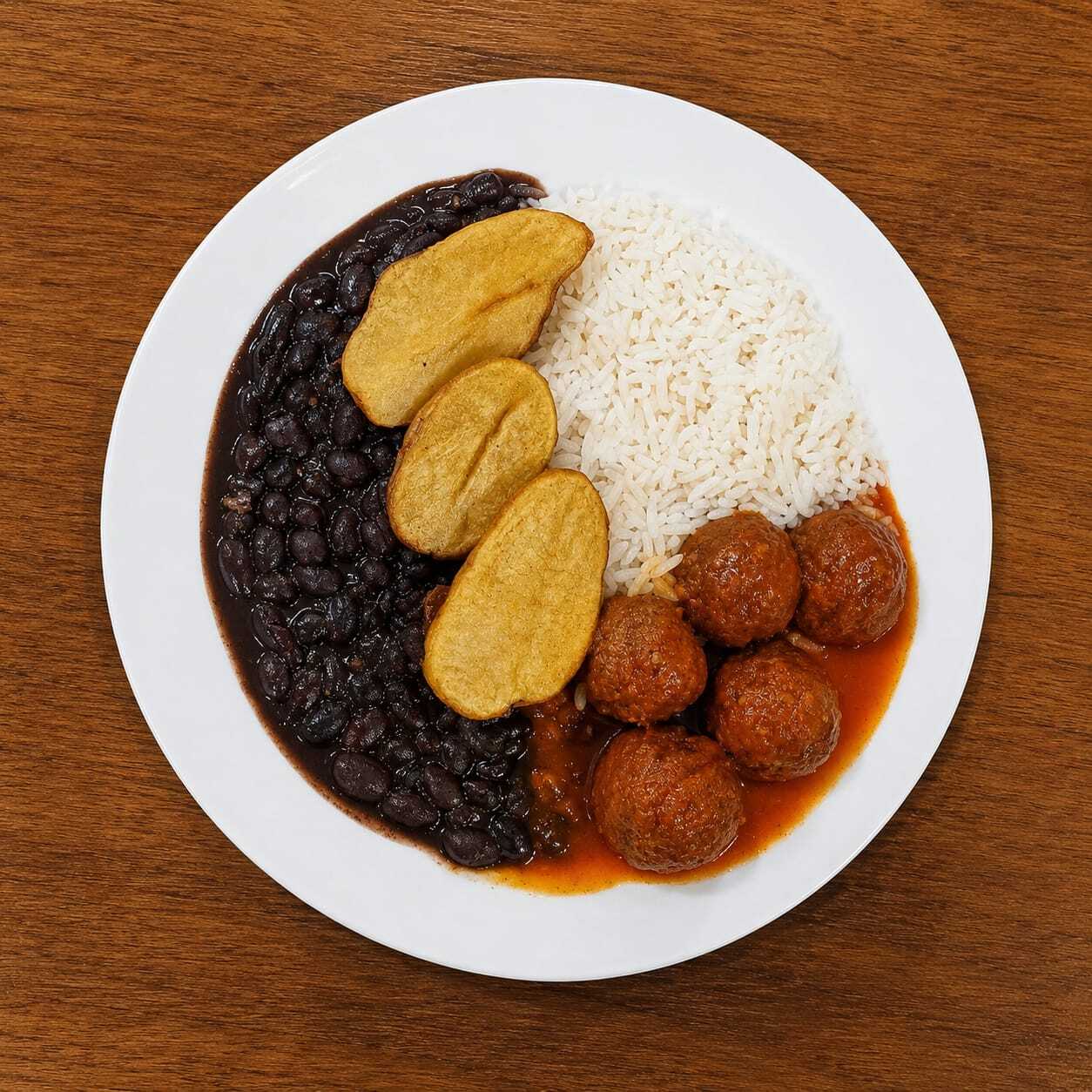 150g de Almondega com molho -Arroz -Feijão -Batata rústica