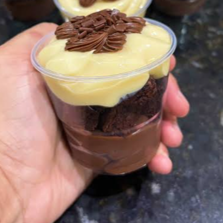 Delicioso creme de ninho com um delicioso brigadeiro e cobertura de Nutella