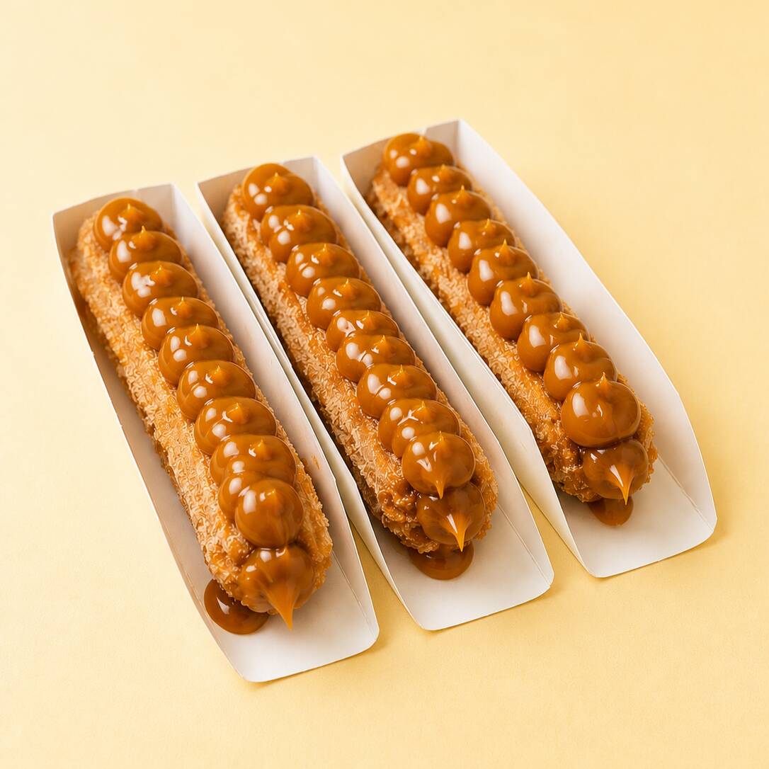 Um clássico que vai além! Churros crocante por fora, macio por dentro e recheado com generosidade — por dentro e por fora! Uma explosão de sabor em cada mordida pra quem ama um doce caprichado de verdade.