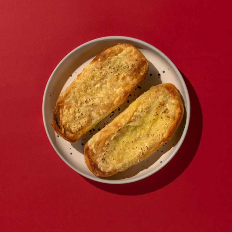 Pão de baguete com maionese de girassol e queijo parmesão à base de castanhas
