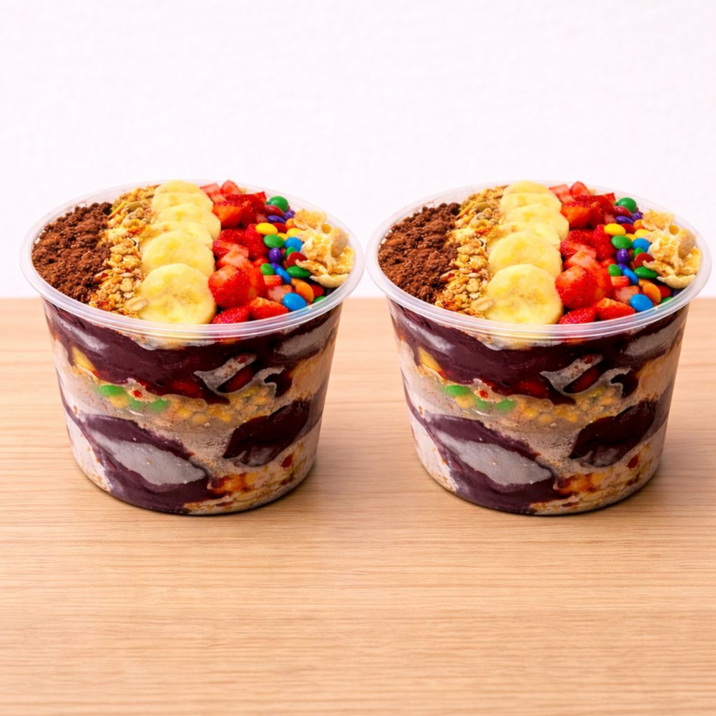 2L de açaí pagando menos e de bônus 12 complementos para rechear muuuito seus potes! Escolha da sua maneira e se delicie!
