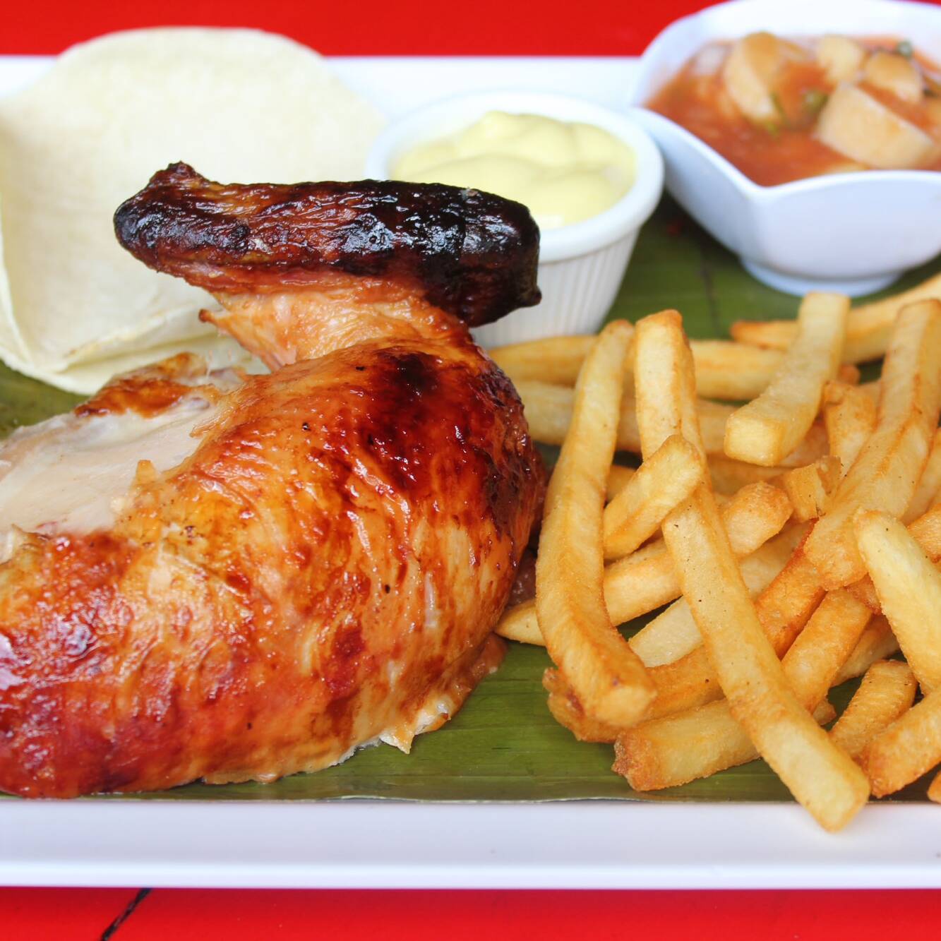 Combo de Pollo Asado con Papas Fritas + Bebida