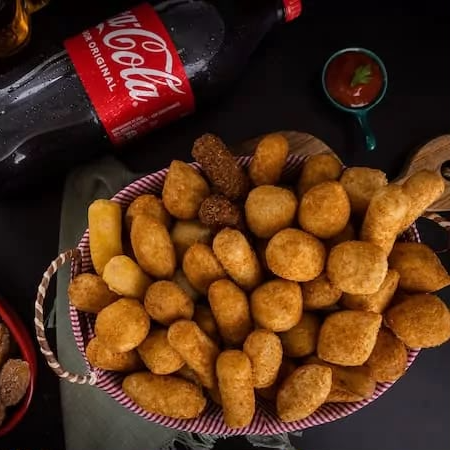 🍫😋50 mini churros crocantes e recheados com doce de leite! Perfeitos para adoçar seu dia. Peça já o seu! 🛵❤️