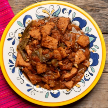 Chuleta Ahumada Entomatada o Encebollada