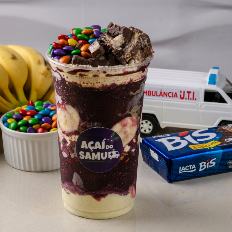 Açaí Cremoso Com M&M’s, Banana Fatiada, Pedaços De Bis, Leite Condensado Cremoso E Leite Em Pó. Combinação Divertida, Doce E Irresistível Na Medida Certa.