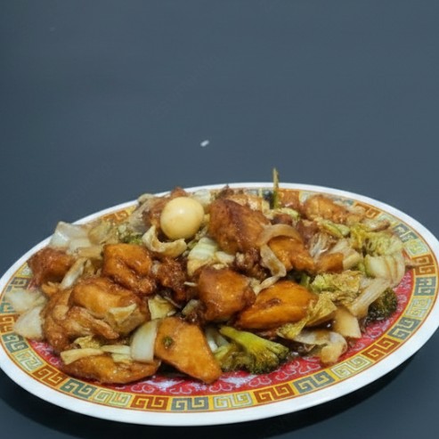 Filé de peixe com legumes diversos, temperados ao molho de soja.