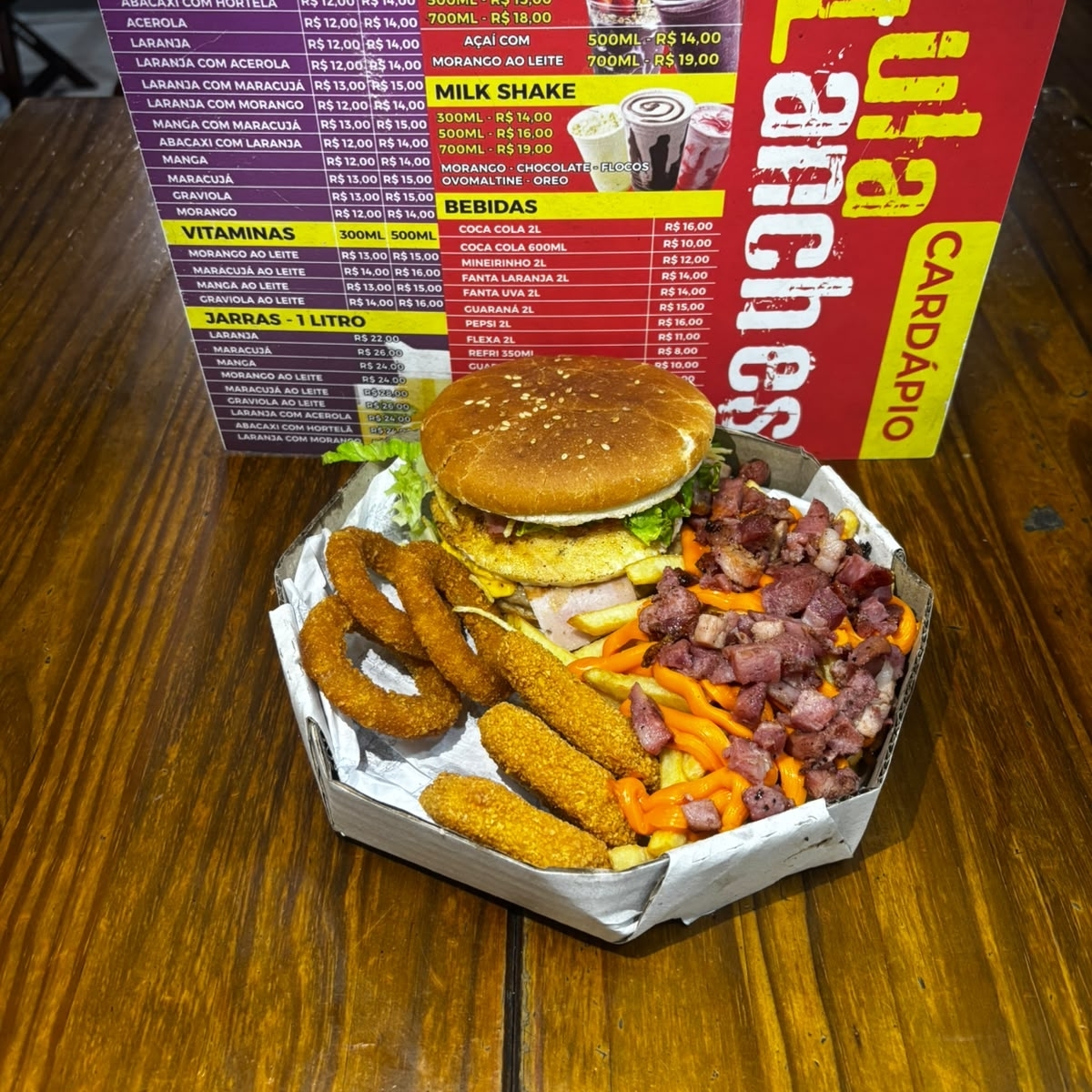 1 x tudo de 2 carnes , 3 nuguetts , 3 aneis de cebola , batata media turbinada e 1 coca lata