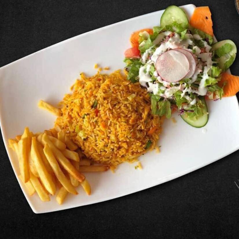 Arroz Con Pollo + Bebida