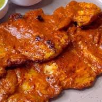 Muslo de pollo enchilado